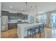 Modern kitchen with stainless steel appliances and an island with seating at 1455 Red Tide Rd, Mount Pleasant, SC 29466