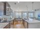 Modern kitchen with stainless steel appliances and breakfast bar at 1455 Red Tide Rd, Mount Pleasant, SC 29466