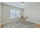 Home office with wood floors, a window with blinds, and stylish decor at 1455 Red Tide Rd, Mount Pleasant, SC 29466