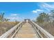 Scenic boardwalk leading to a tranquil waterfront view at 1455 Red Tide Rd, Mount Pleasant, SC 29466
