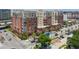Aerial view of a modern brick building, with ample parking and city views at 150 Bee St # 318, Charleston, SC 29401