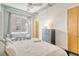 Spacious bedroom with large window and dresser at 150 Bee St # 318, Charleston, SC 29401
