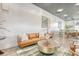 Elegant lobby with a leather couch, coffee table, and modern artwork at 150 Bee St # 318, Charleston, SC 29401