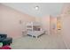 Pink bedroom with bunk bed and access to hallway at 1669 Indy Dr, North Charleston, SC 29405