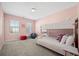 Bedroom with bunk bed, pink walls, and gray carpeting at 1669 Indy Dr, North Charleston, SC 29405
