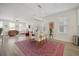 Open concept dining area with glass top table and seating for four at 1669 Indy Dr, North Charleston, SC 29405