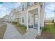 Townhome exterior with walkway and landscaping at 1669 Indy Dr, North Charleston, SC 29405