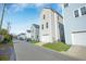 Row of houses with light gray siding and attached garages at 1669 Indy Dr, North Charleston, SC 29405