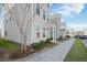 Side view of the townhome, showcasing the exterior and landscaping at 1669 Indy Dr, North Charleston, SC 29405