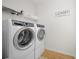 Laundry room with washer, dryer, and overhead shelving at 1669 Indy Dr, North Charleston, SC 29405