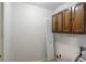 Laundry area with wood cabinets and folding space at 179 Foxborough Rd, Goose Creek, SC 29445