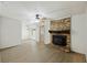 Living room featuring a brick fireplace and ceiling fan at 179 Foxborough Rd, Goose Creek, SC 29445