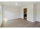 Bright living room with hardwood floors and access to kitchen at 179 Foxborough Rd, Goose Creek, SC 29445