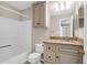 Updated bathroom with granite countertop and beige cabinets at 188 Midland Pkwy # 205, Summerville, SC 29485