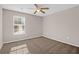 Bright bedroom with carpet and a large window at 188 Midland Pkwy # 205, Summerville, SC 29485