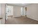 Spacious bedroom with carpet flooring and access to a full bathroom at 188 Midland Pkwy # 205, Summerville, SC 29485