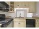 Kitchen boasts granite countertops and black appliances at 188 Midland Pkwy # 205, Summerville, SC 29485