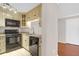 Kitchen with granite counters and black appliances at 188 Midland Pkwy # 205, Summerville, SC 29485