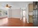 Living room with hardwood floors and access to other rooms at 188 Midland Pkwy # 205, Summerville, SC 29485