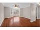 Spacious living room with hardwood floors and large windows at 188 Midland Pkwy # 205, Summerville, SC 29485