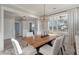 Spacious dining room with stylish lighting, an elegant wooden table, and comfortable seating at 200 Clearblue Loop, Summerville, SC 29486