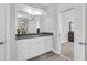 Bathroom with granite countertop, white cabinets, and walk-in shower at 2015 Barn Swallow Rd, Summerville, SC 29483