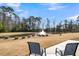 Relaxing pond view with fountain and seating area at 2015 Barn Swallow Rd, Summerville, SC 29483