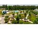 Aerial view of community with pool, barn, and landscaped green spaces at 206 Denham St, Summerville, SC 29486
