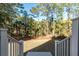 Spacious backyard with a grassy area and trees at 2084 Amenity Park Dr, Mount Pleasant, SC 29466