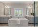 Bathroom with double vanity and large soaking tub at 2084 Amenity Park Dr, Mount Pleasant, SC 29466