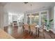 Bright dining room with hardwood floors and views to the backyard at 2084 Amenity Park Dr, Mount Pleasant, SC 29466