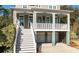 Two-story house with a large front porch and attached garage at 2084 Amenity Park Dr, Mount Pleasant, SC 29466