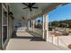 Spacious front porch with ceiling fan and view of neighborhood at 2084 Amenity Park Dr, Mount Pleasant, SC 29466