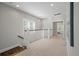 Bright hallway with carpeted floors and white trim at 2084 Amenity Park Dr, Mount Pleasant, SC 29466