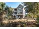 Two story house exterior with a large backyard at 2084 Amenity Park Dr, Mount Pleasant, SC 29466