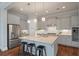 Modern kitchen with stainless steel appliances and granite island at 2084 Amenity Park Dr, Mount Pleasant, SC 29466