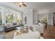 Open living room with hardwood floors, and large windows at 2084 Amenity Park Dr, Mount Pleasant, SC 29466