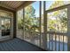 Screened porch overlooking a wooded backyard at 2084 Amenity Park Dr, Mount Pleasant, SC 29466