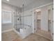 Walk-in shower with glass enclosure and built-in seat at 2084 Amenity Park Dr, Mount Pleasant, SC 29466