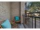 Relaxing balcony with city views and comfortable seating at 21 George St # 114, Charleston, SC 29401