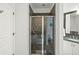 Clean bathroom with a walk-in shower and glass enclosure at 21 George St # 114, Charleston, SC 29401