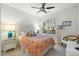 Cozy bedroom with a queen-size bed and plenty of natural light at 21 George St # 114, Charleston, SC 29401