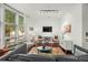 Bright living room with hardwood floors and ample natural light at 21 George St # 114, Charleston, SC 29401