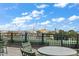 Enjoy city views from this rooftop deck, complete with seating at 21 George St # 114, Charleston, SC 29401