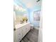Charming bathroom with light blue walls and white vanity at 212 Thomaston Ave, Summerville, SC 29485