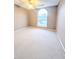 Bright bedroom featuring an arched window and ceiling fan at 212 Thomaston Ave, Summerville, SC 29485