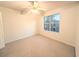 Well-lit bedroom with large window and ceiling fan at 212 Thomaston Ave, Summerville, SC 29485