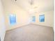 Spacious bedroom with neutral carpeting and multiple windows at 212 Thomaston Ave, Summerville, SC 29485