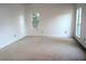 Spacious bedroom with neutral carpeting and large windows at 212 Thomaston Ave, Summerville, SC 29485