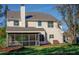 Two-story house with screened porch and landscaped yard at 212 Thomaston Ave, Summerville, SC 29485